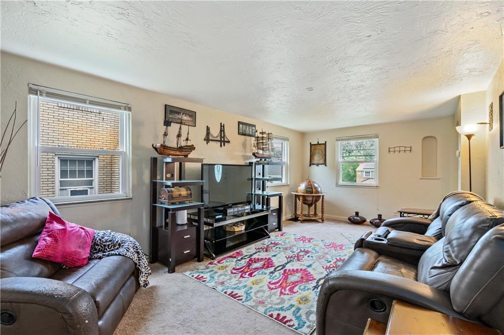 3408 Willett Road Pittsburgh, PA 15227 - Photo 5 of 34 Living room located on the main floor is 20x10