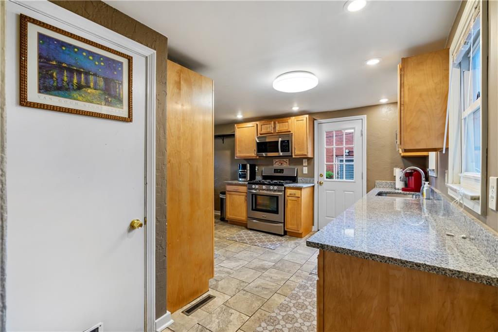 3408 Willett Road Pittsburgh, PA 15227 - Photo 7 of 34 Kitchen & Dining area is Kitchen & Dining area located on the main floor is 20x10