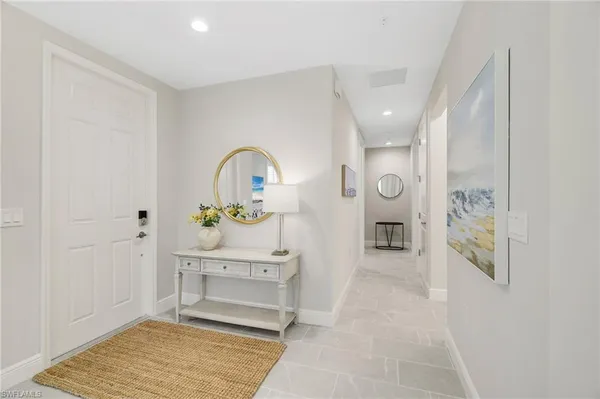 a living room with furniture and a table