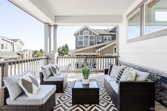 a view of a living room and wooden floor