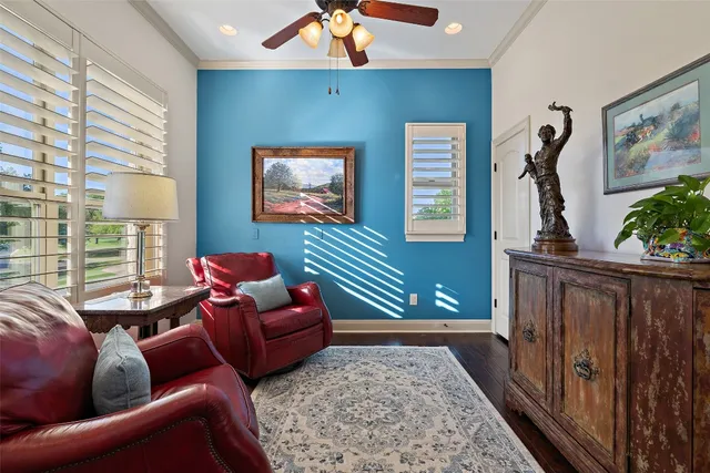 a living room with furniture and a rug