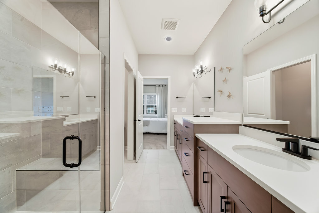 1409 Notting Hl Drive Lemont, IL 60439 - Photo 14 of 31 a bathroom with a double vanity sink mirror double and shower