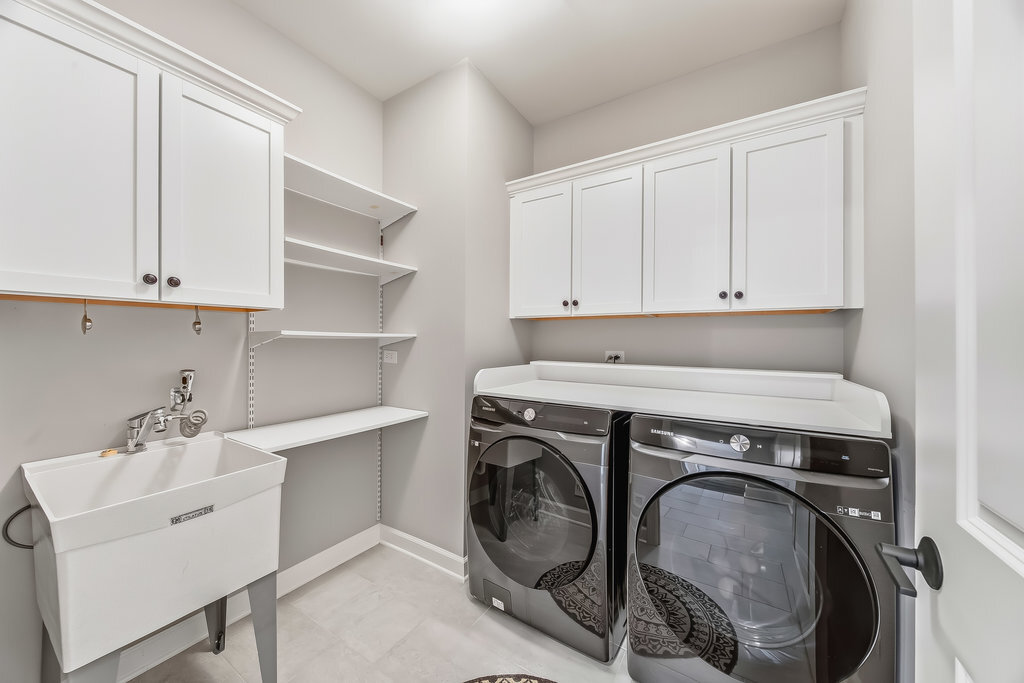 1409 Notting Hl Drive Lemont, IL 60439 - Photo 17 of 31 a utility room with sink dryer and washer