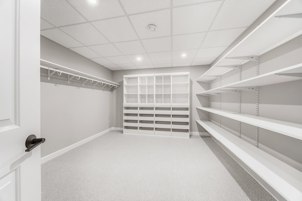 1409 Notting Hl Drive Lemont, IL 60439 - Photo 21 of 31 a view of walk in closet with empty racks