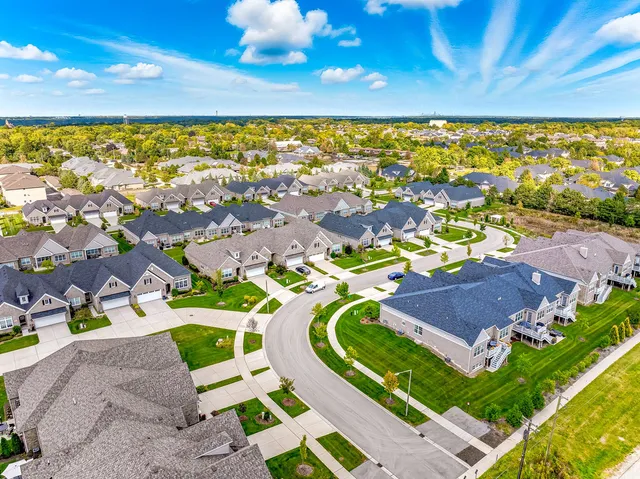 a view of a houses with a swimming pool