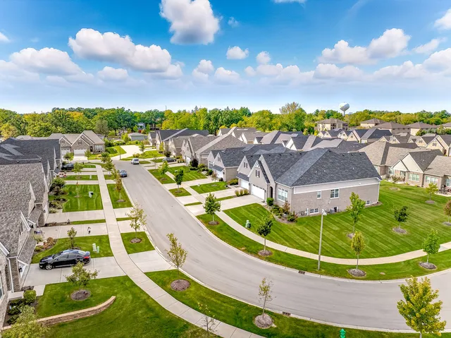 a view of lot of houses with outdoor space