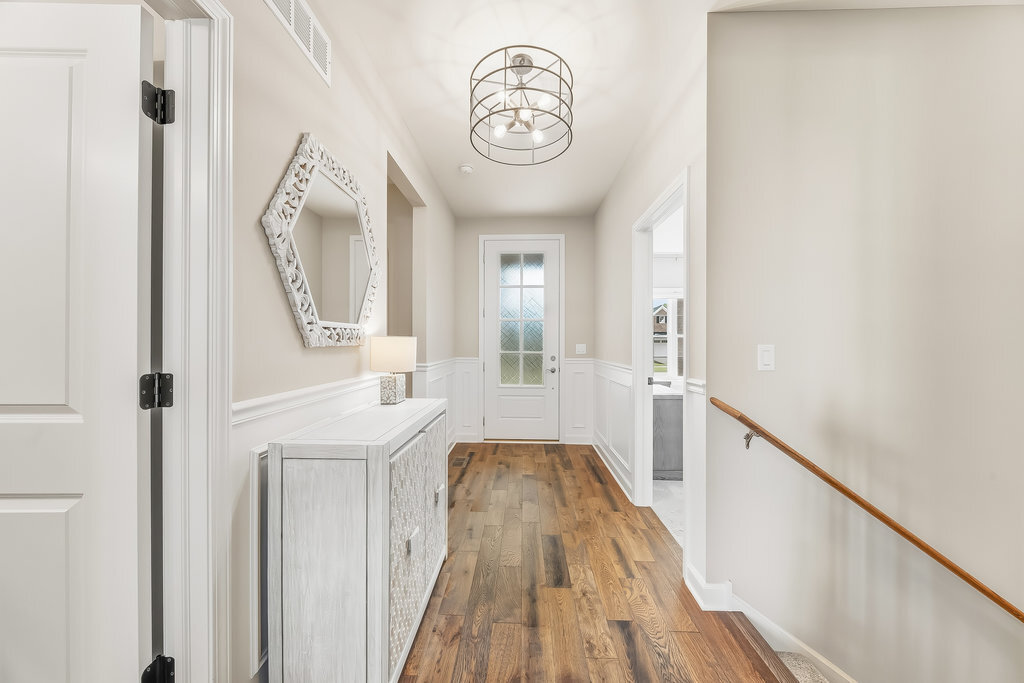 1409 Notting Hl Drive Lemont, IL 60439 - Photo 3 of 31 a view of a hallway with wooden floor and a hallway