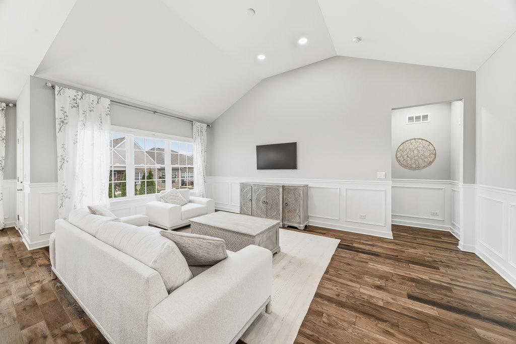 1409 Notting Hl Drive Lemont, IL 60439 - Photo 5 of 31 a living room with furniture and a flat screen tv