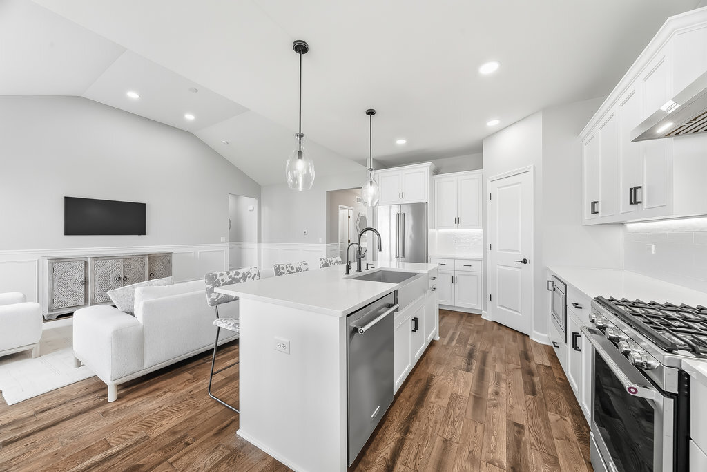 1409 Notting Hl Drive Lemont, IL 60439 - Photo 10 of 31 a large kitchen with kitchen island a white counter space a sink stainless steel appliances and cabinets