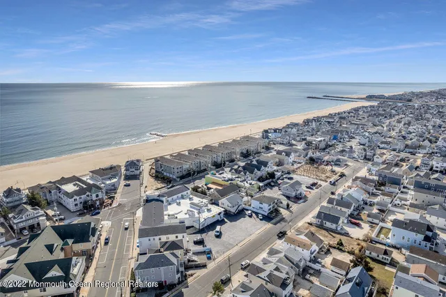 a view of entryway and wooden floor