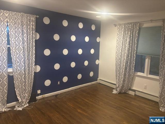 992 Ridge Court New Milford, NJ 07646 - Photo 11 of 15 a view of an empty room with a door