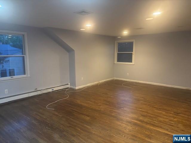 992 Ridge Court New Milford, NJ 07646 - Photo 13 of 15 an empty room with wooden floor and windows