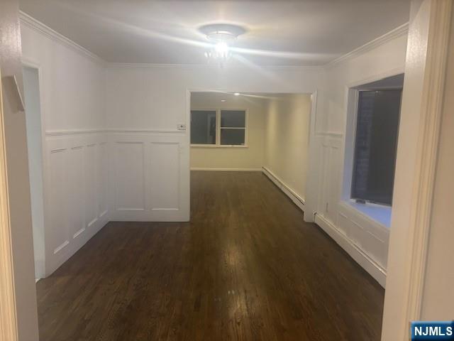 992 Ridge Court New Milford, NJ 07646 - Photo 4 of 15 an empty room with wooden floor and windows
