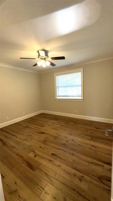 1917 Northeast 3rd Street, Unit 113 Deerfield Beach, FL 33441 - Photo 16 of 23 a view of a room with wooden floor