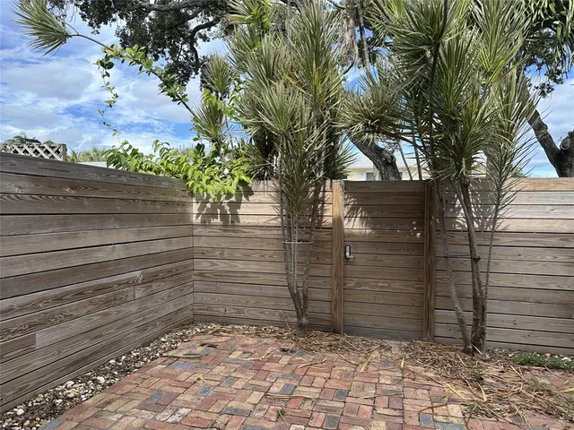 a view of a back yard of the house