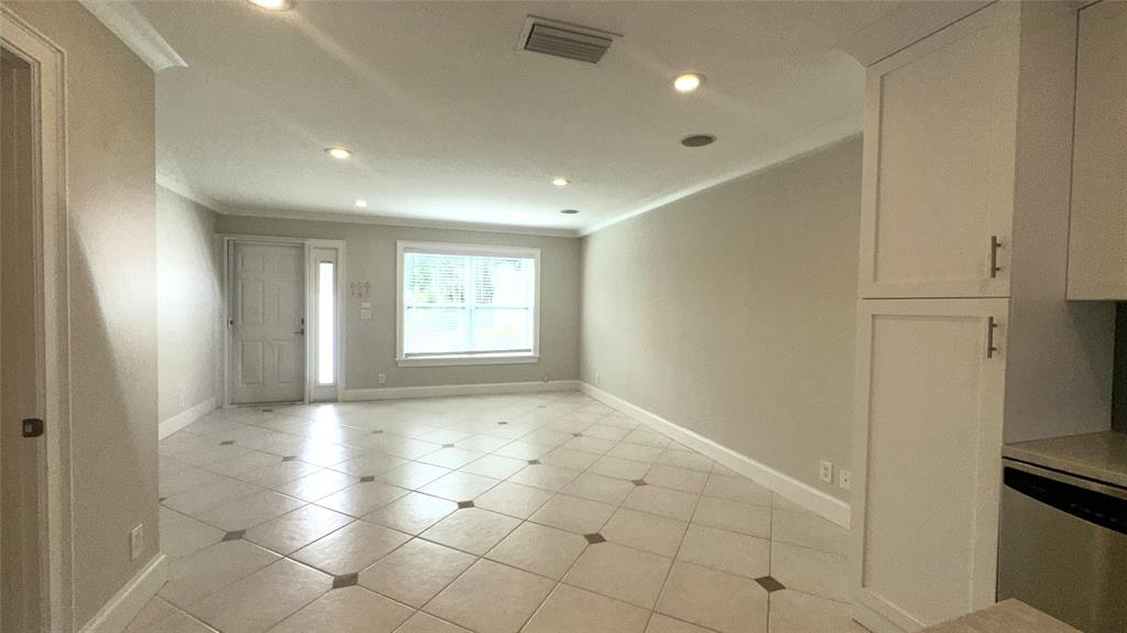 1917 Northeast 3rd Street, Unit 113 Deerfield Beach, FL 33441 - Photo 6 of 23 a view of an empty room and a window