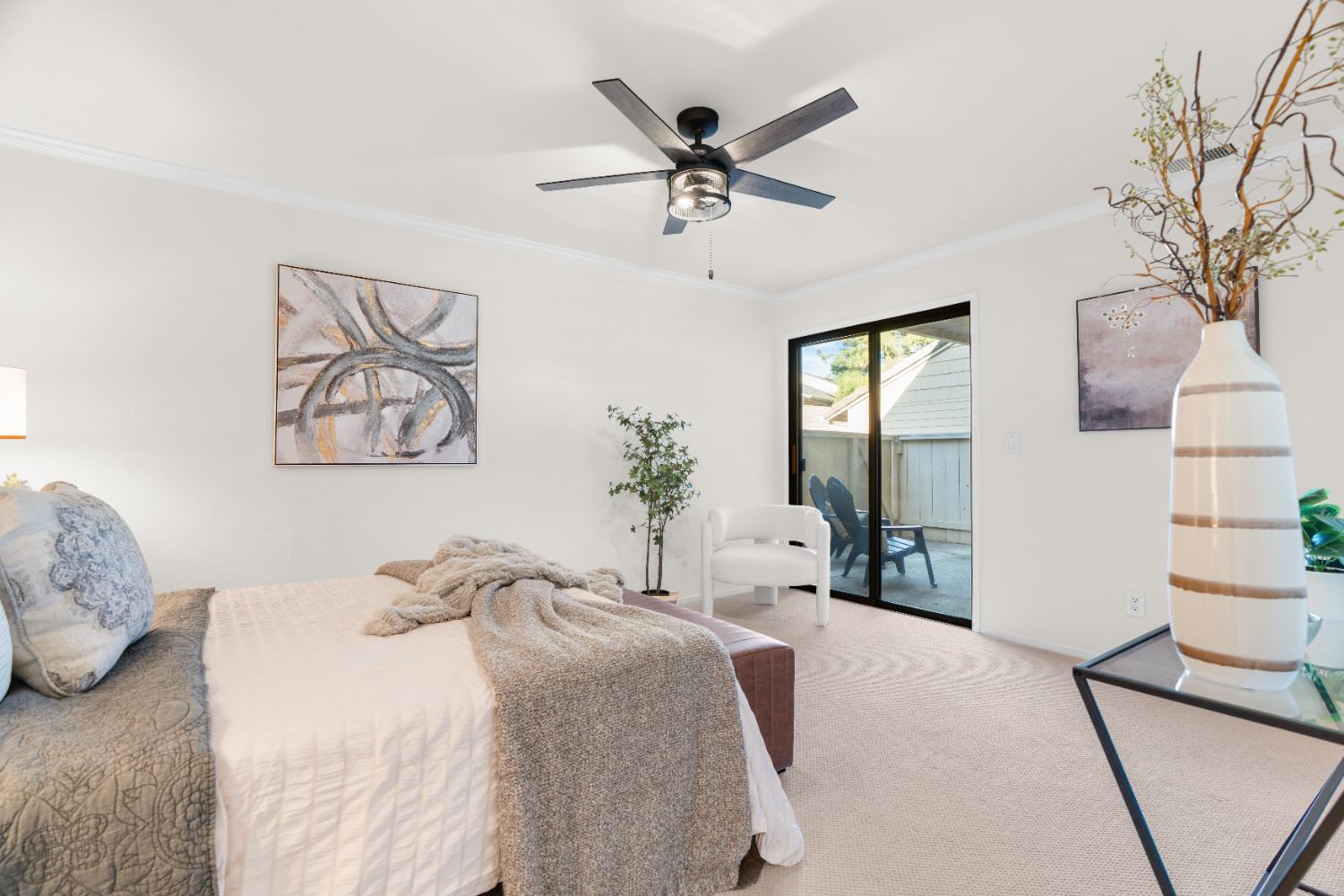 2401 Eilers Lane, Unit 105 Lodi, CA 95242 - Photo 13 of 23 a bedroom with a large bed and a chandelier