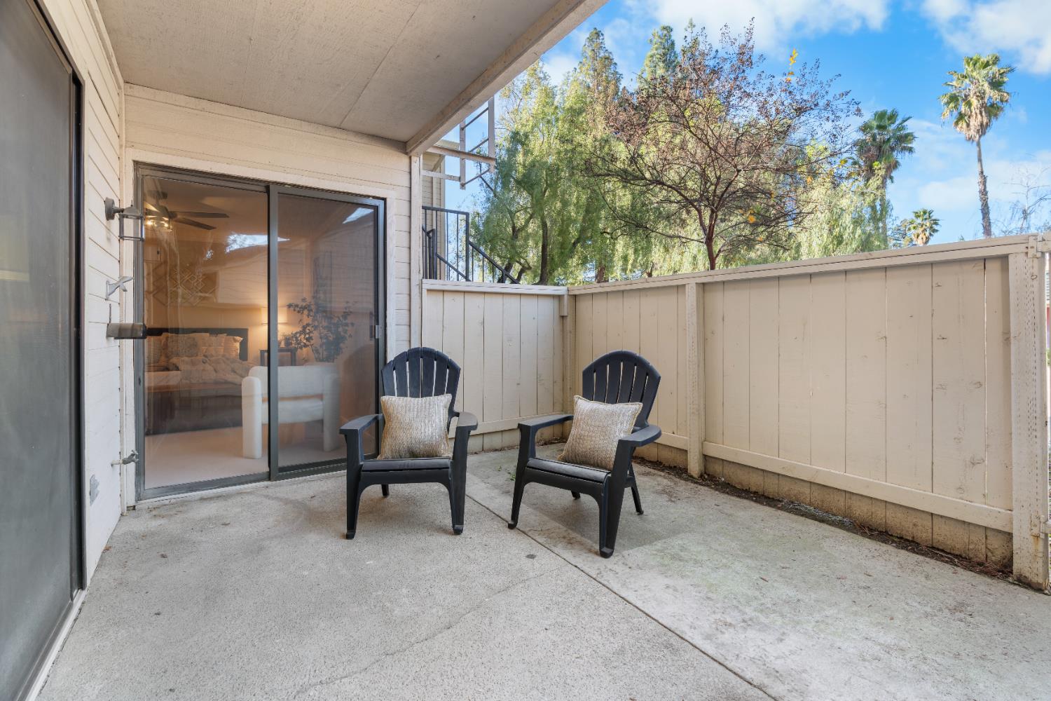 2401 Eilers Lane, Unit 105 Lodi, CA 95242 - Photo 17 of 23 a backyard of a house with table and chairs