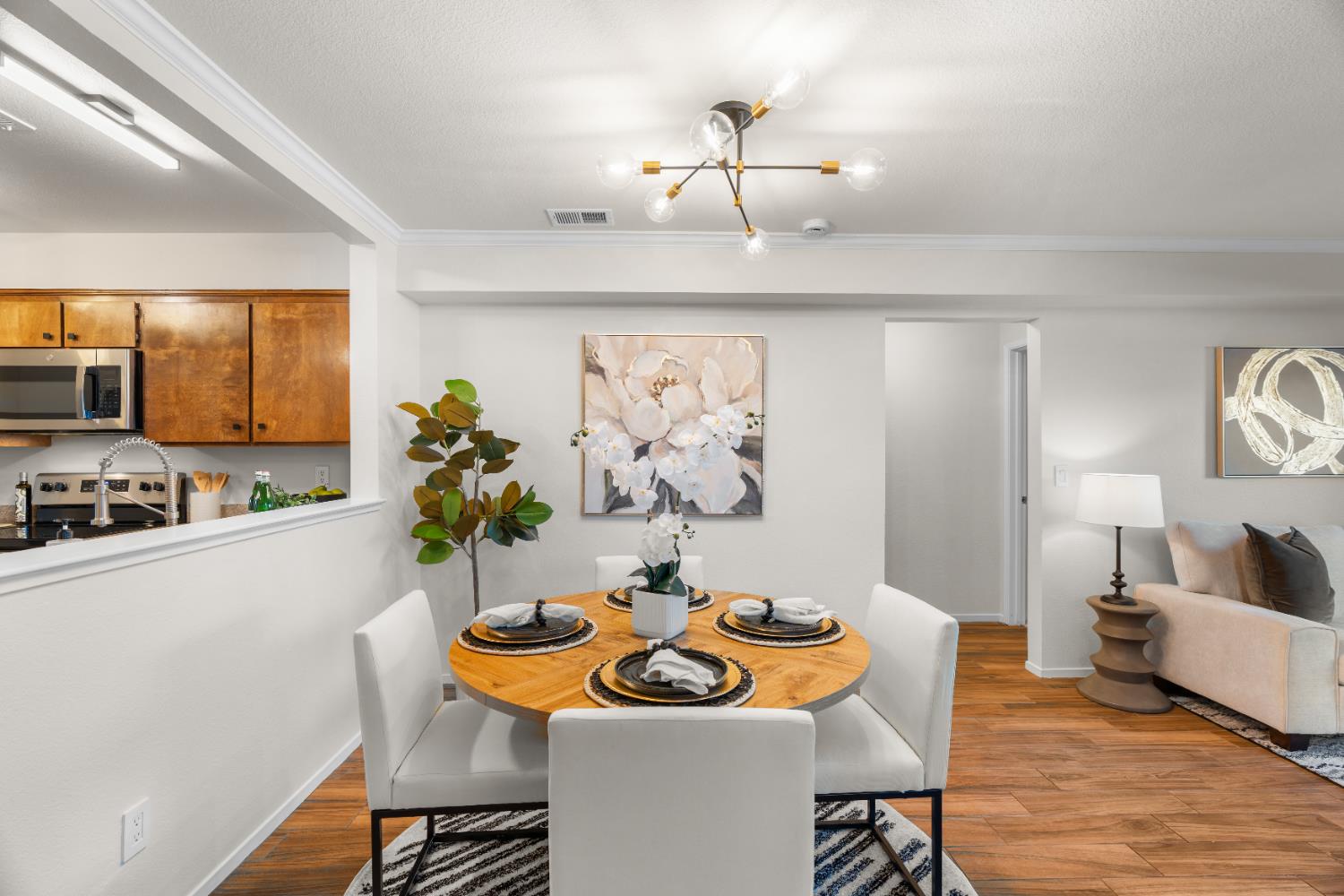 2401 Eilers Lane, Unit 105 Lodi, CA 95242 - Photo 2 of 23 a view of a dining room with furniture and wooden floor