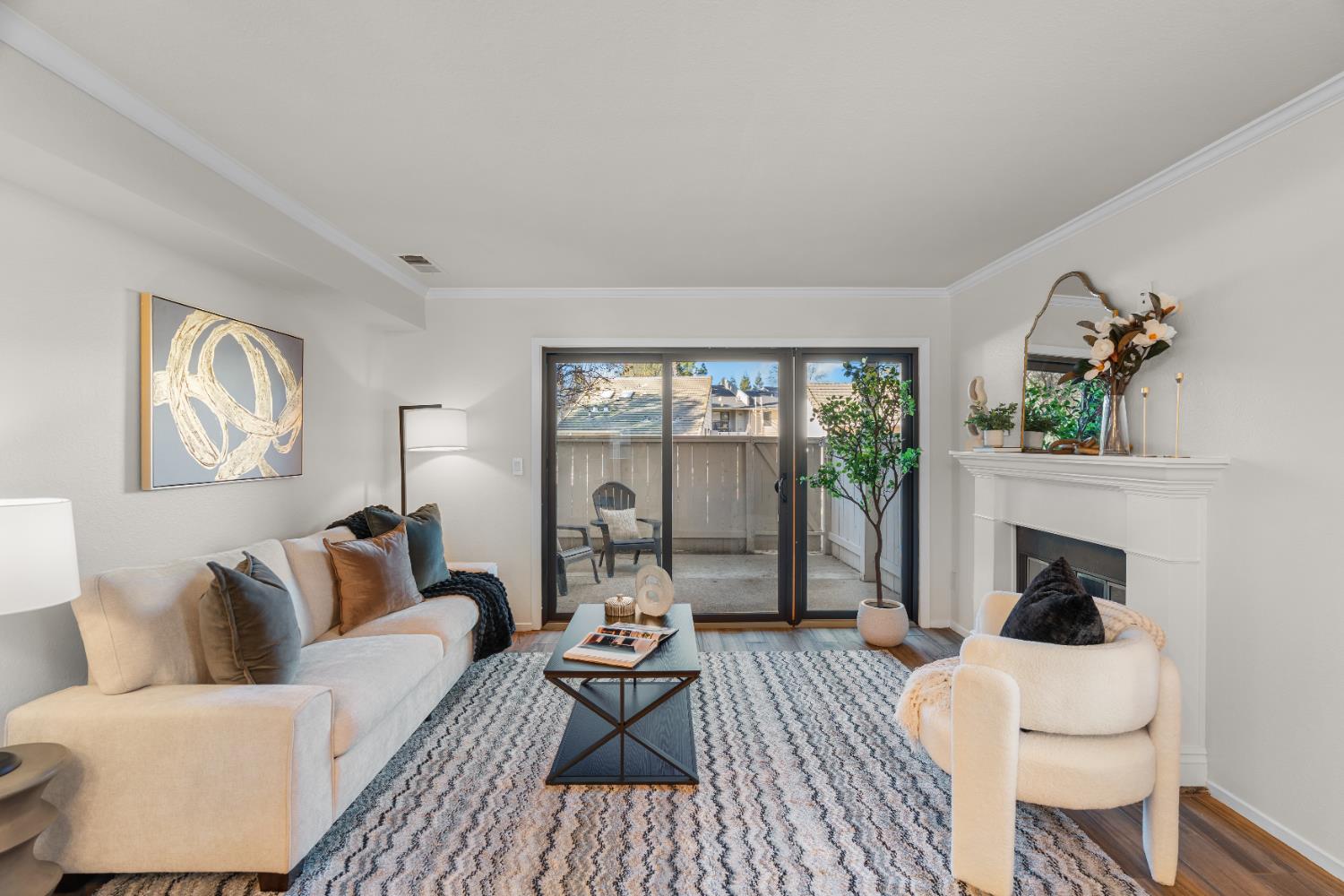 2401 Eilers Lane, Unit 105 Lodi, CA 95242 - Photo 3 of 23 a living room with furniture and a fireplace