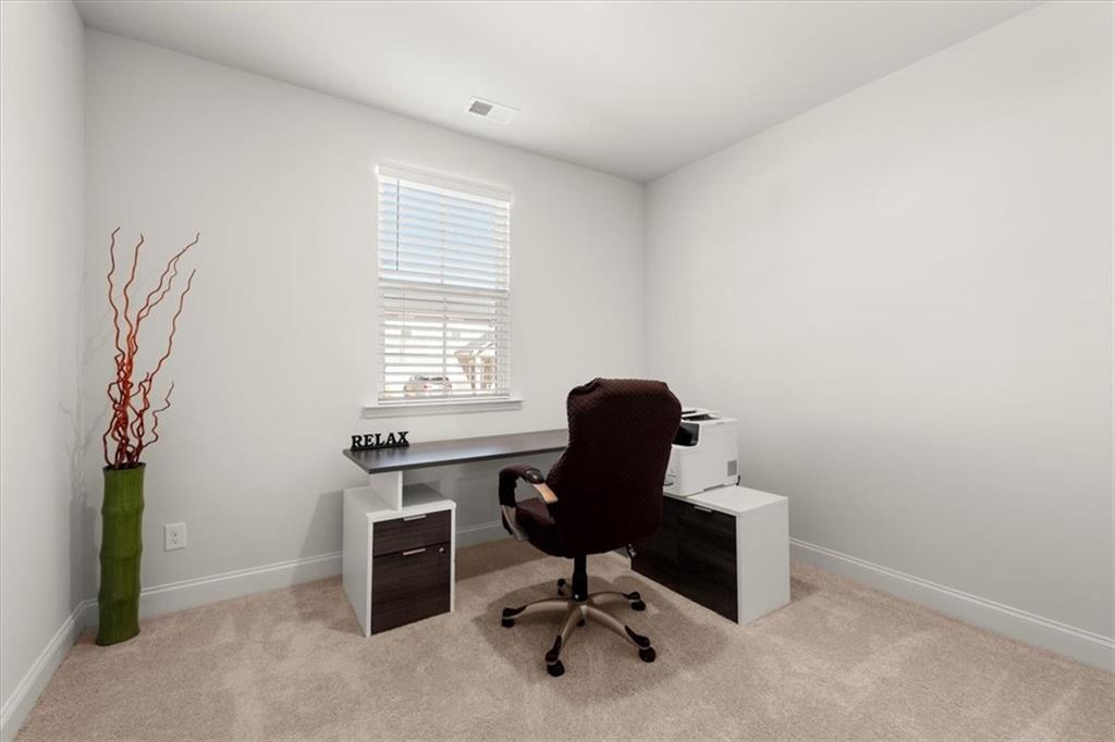 29 Dew Drop Pointe Dallas, GA 30157 - Photo 13 of 41 a view of a workspace with furniture