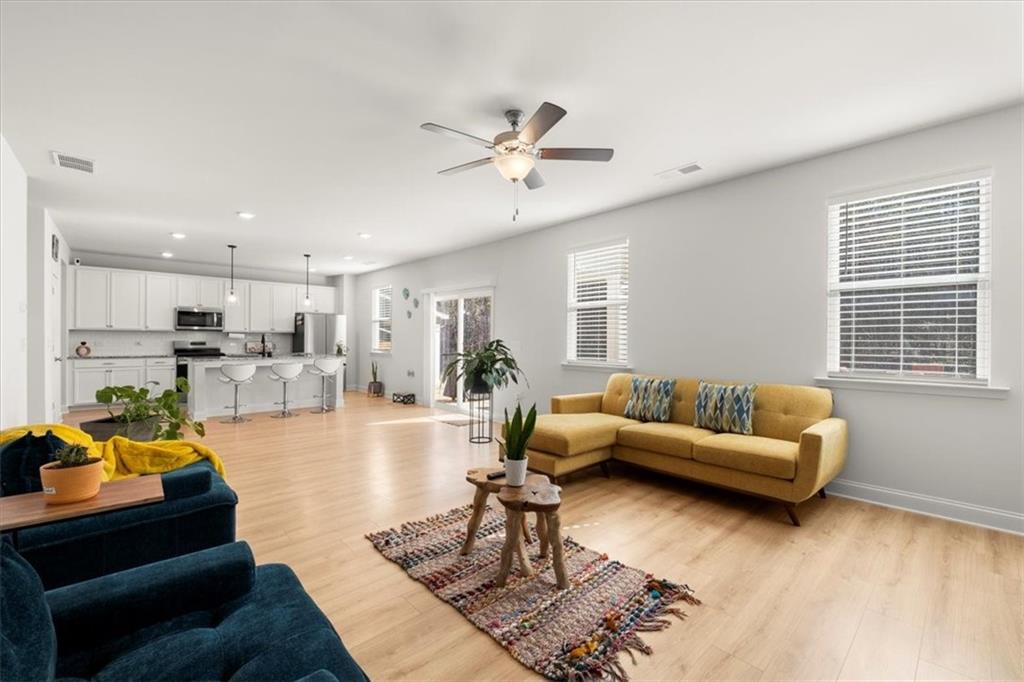 29 Dew Drop Pointe Dallas, GA 30157 - Photo 25 of 41 a living room with furniture and kitchen view