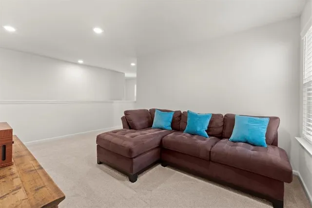 a living room with furniture and a couch