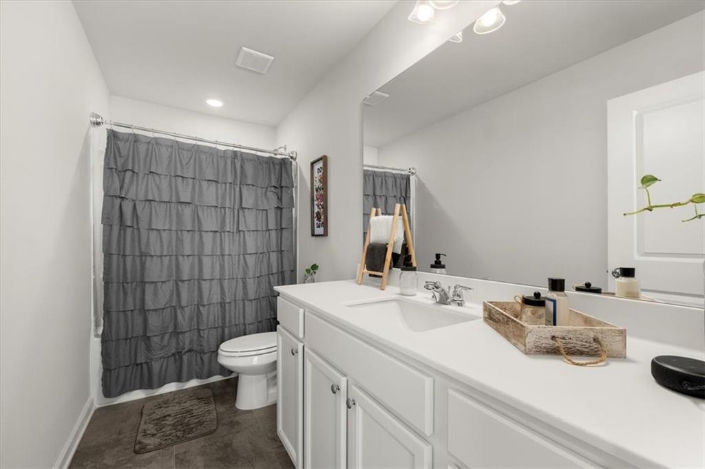 29 Dew Drop Pointe Dallas, GA 30157 - Photo 37 of 41 a bathroom with a sink toilet and shower