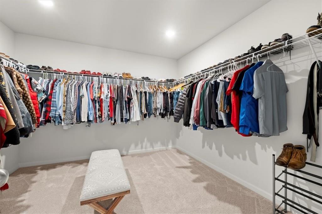 29 Dew Drop Pointe Dallas, GA 30157 - Photo 40 of 41 a view of walk in closet with clothes