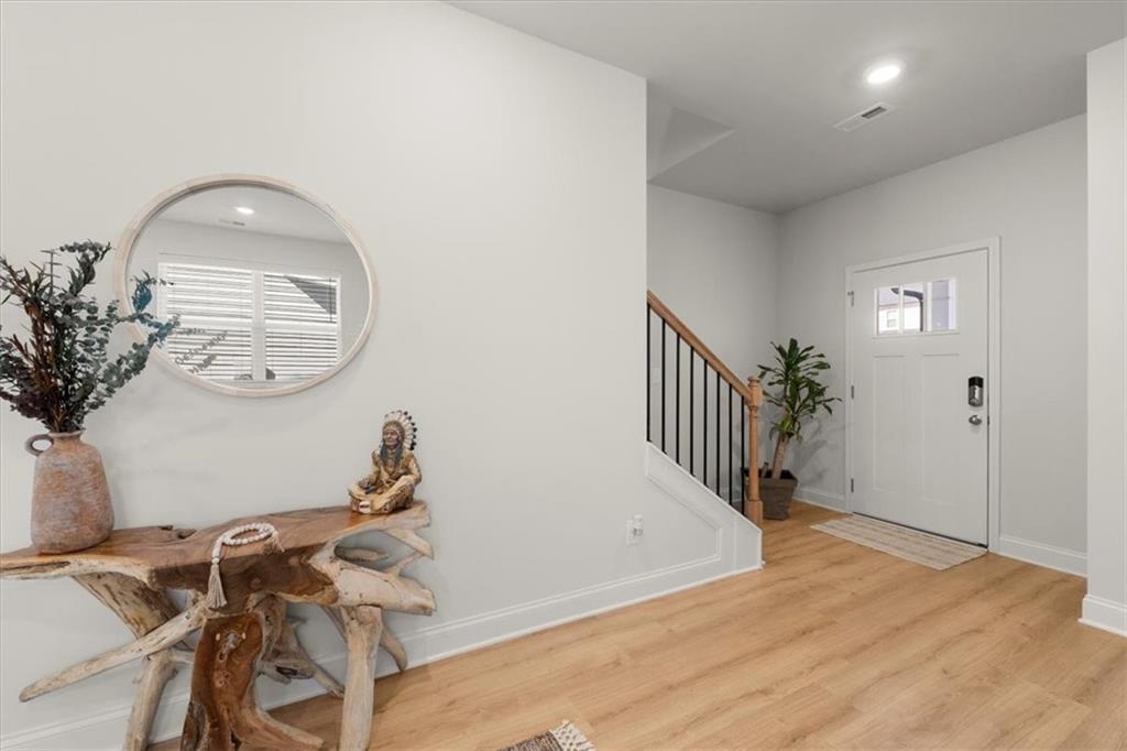 29 Dew Drop Pointe Dallas, GA 30157 - Photo 6 of 41 a view of a room with wooden floor fan and windows