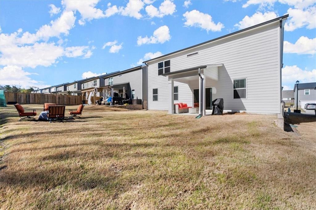 29 Dew Drop Pointe Dallas, GA 30157 - Photo 9 of 41 a view of a house with cars park