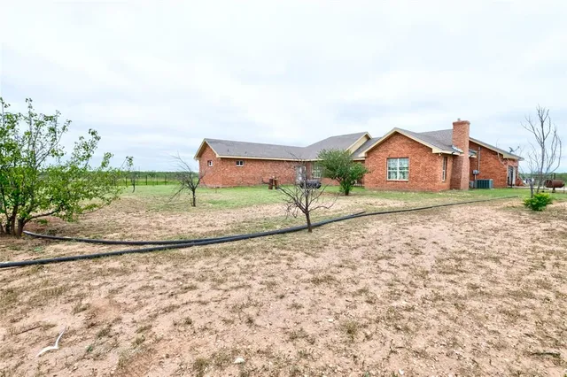 a view of lake with green space