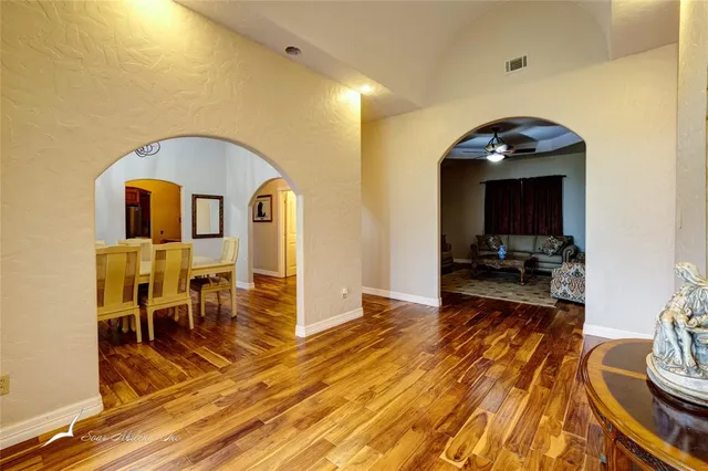 a view of a living room and dining room