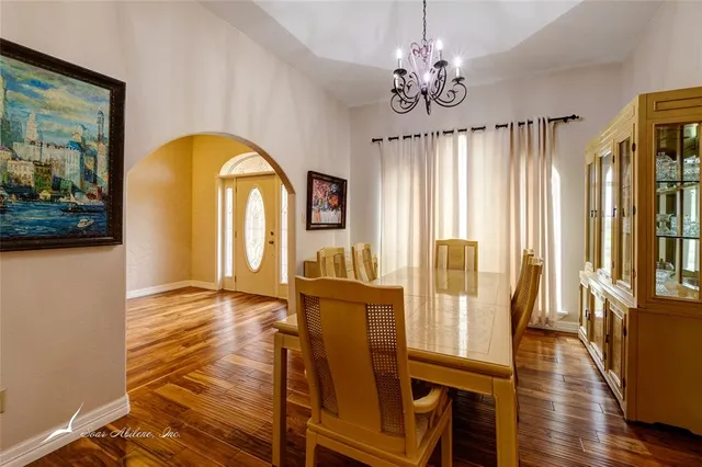 a view of a living room with a large window