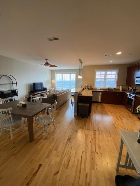 50 North Plum Grove Road, Unit 405 Palatine, IL 60067 - Photo 12 of 14 a living room with furniture and a flat screen tv