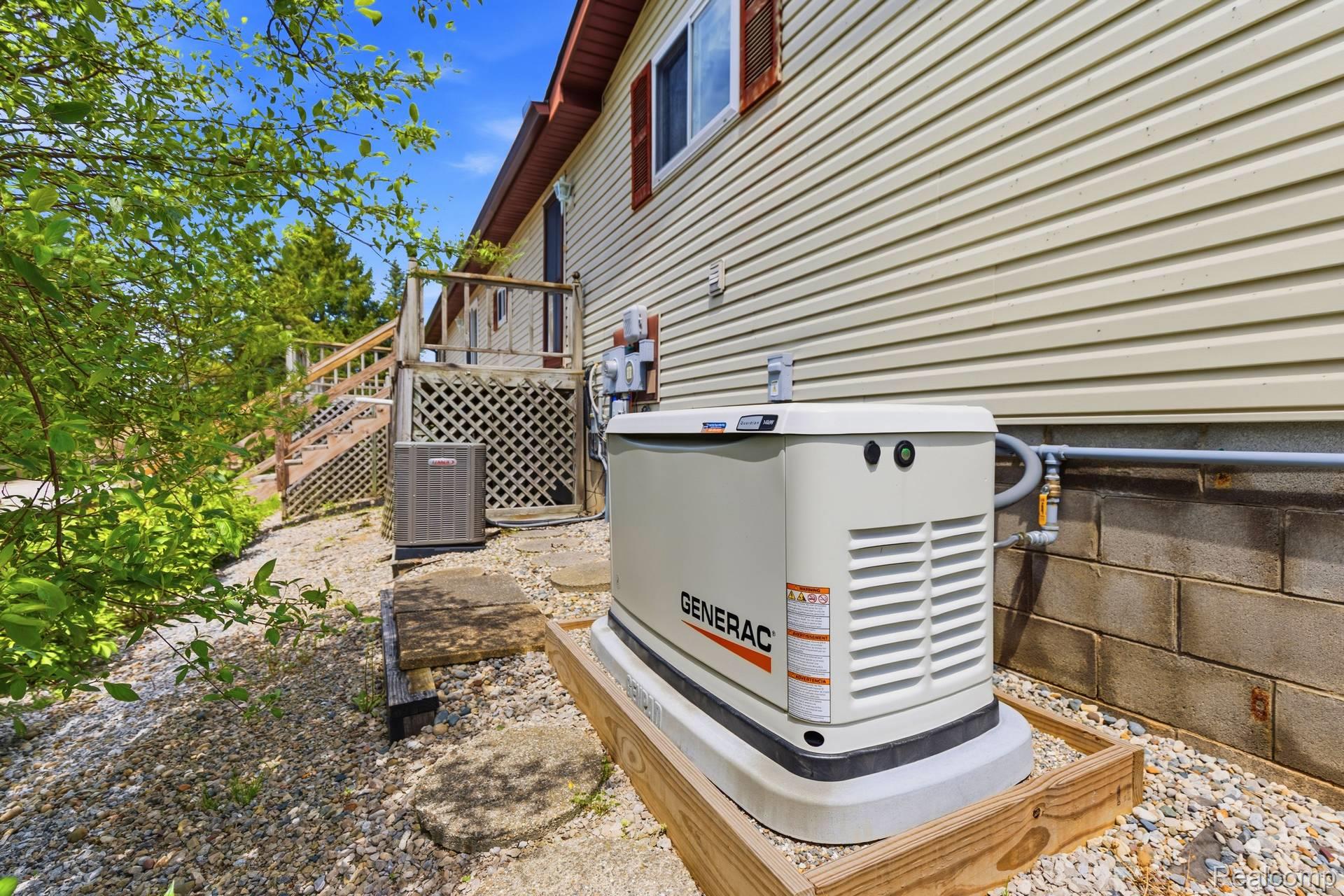 70919 Coon Creek Road Armada, MI 48005 - Photo 40 of 50 Exterior view of stairway and a cooling unit