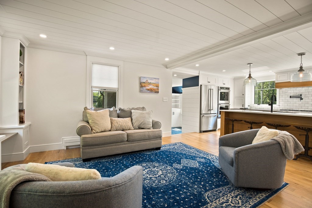 1 True Road Salisbury, MA 01952 - Photo 24 of 41 a living room with furniture and a large window