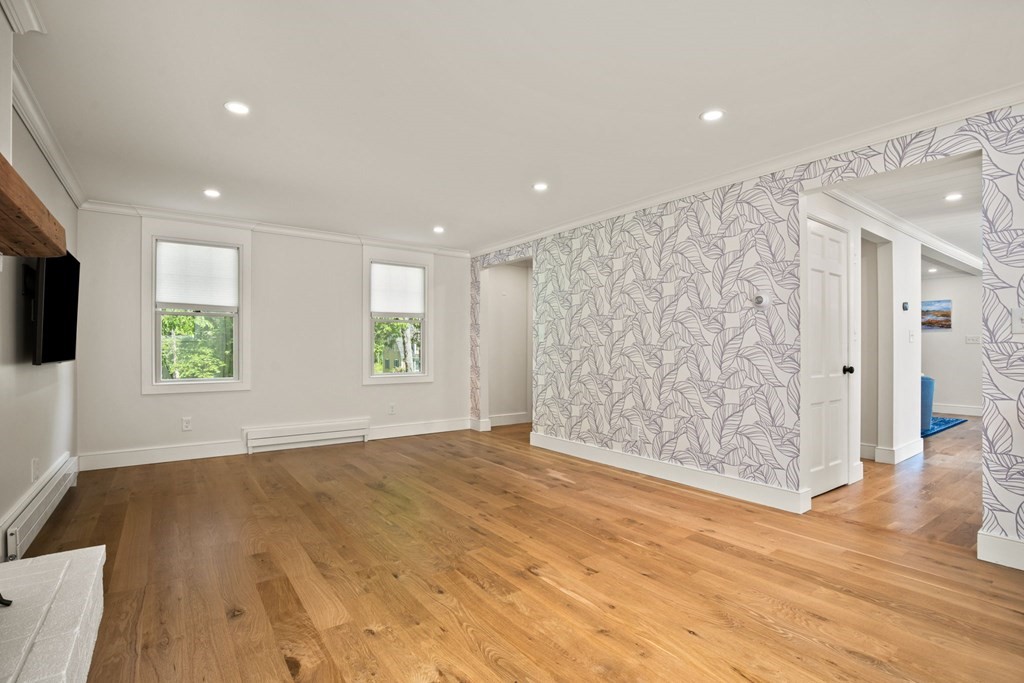 1 True Road Salisbury, MA 01952 - Photo 30 of 41 a view of an empty room with wooden floor and a window