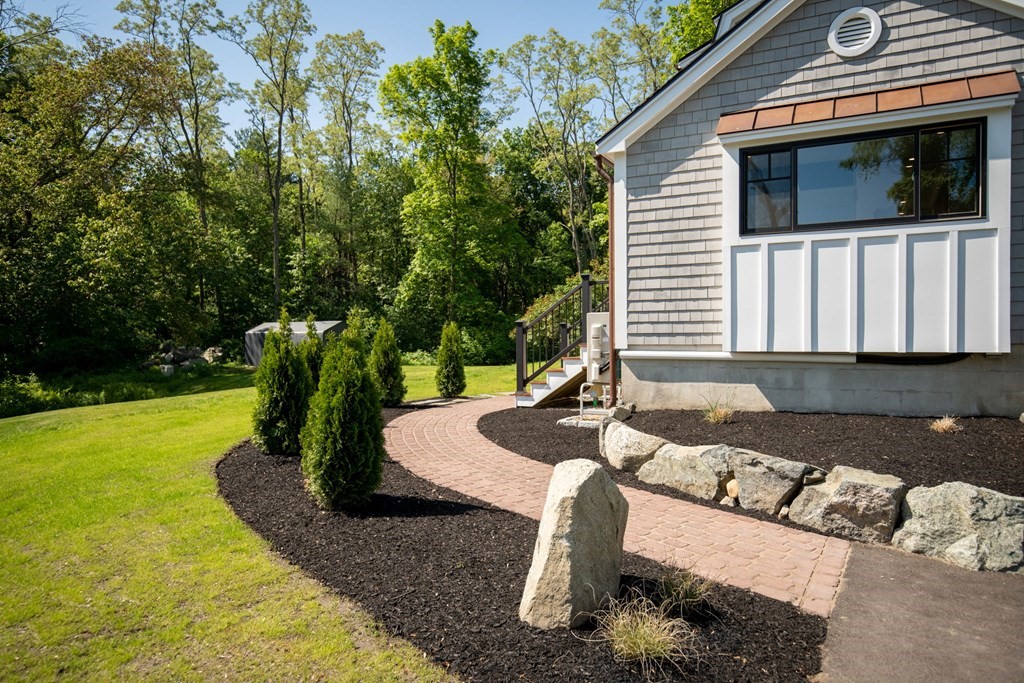 1 True Road Salisbury, MA 01952 - Photo 6 of 41 a house view with a garden space