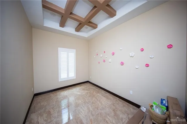 a view of a livingroom with furniture and a flat screen tv
