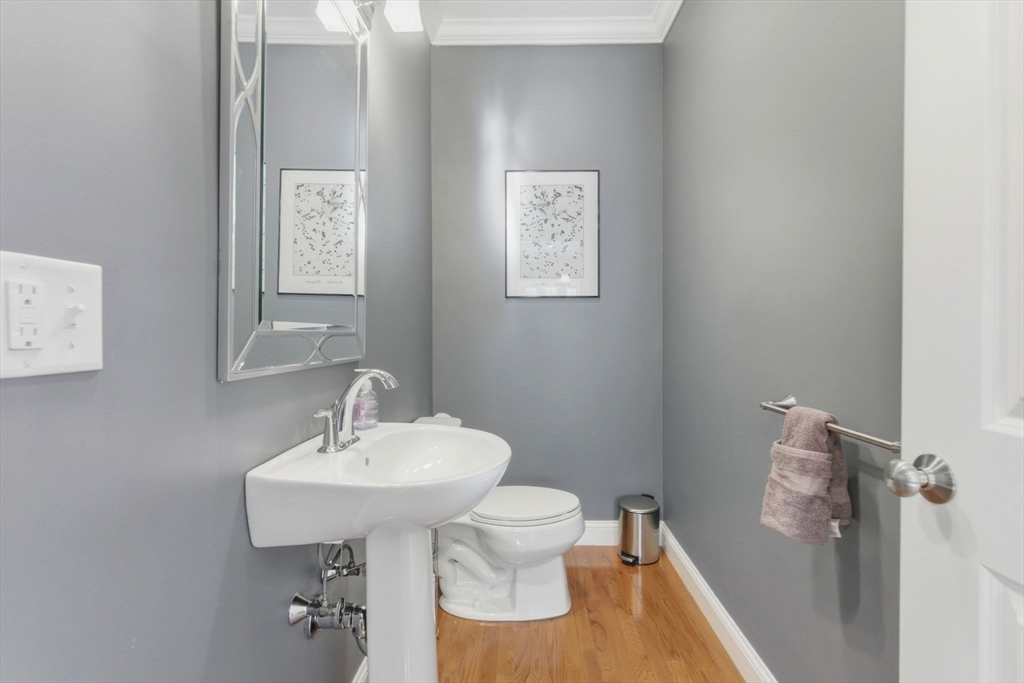 66 Compass Point, Unit 66 North Andover, MA 01845 - Photo 28 of 42 a bathroom with a sink toilet and a mirror
