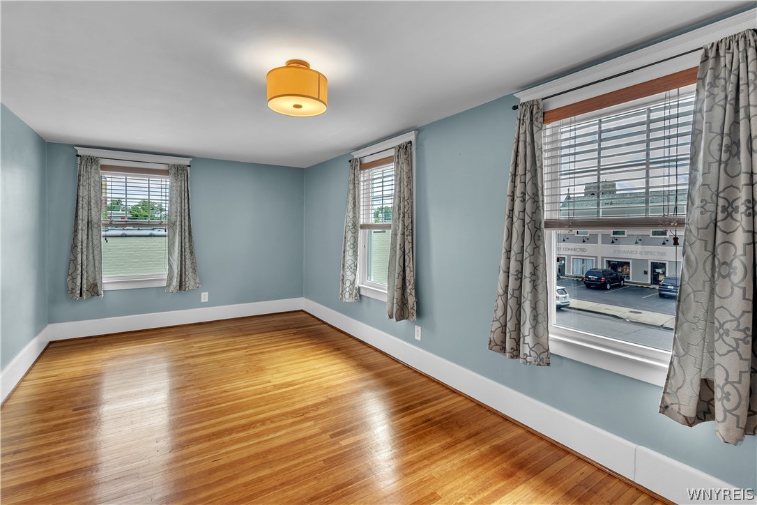 17 Westgate Road Tonawanda, NY 14217 - Photo 19 of 37 The large primary bedroom highlights more gorgeous hardwood floors on the second floor.