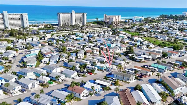 an aerial view of a city with lots of residential buildings