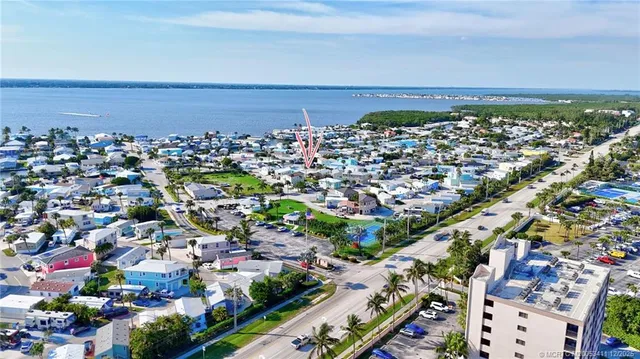 an aerial view of a chairs and table