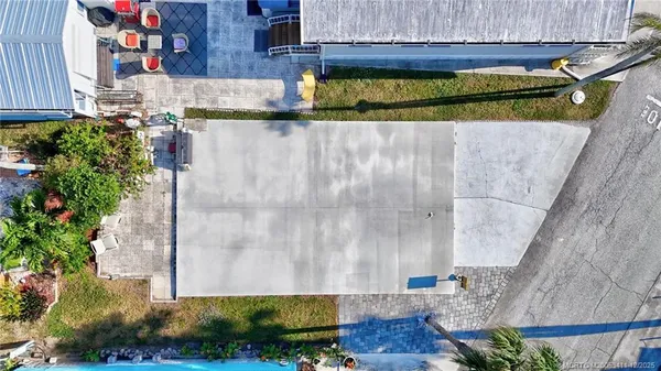 a view of balcony with a potted plant