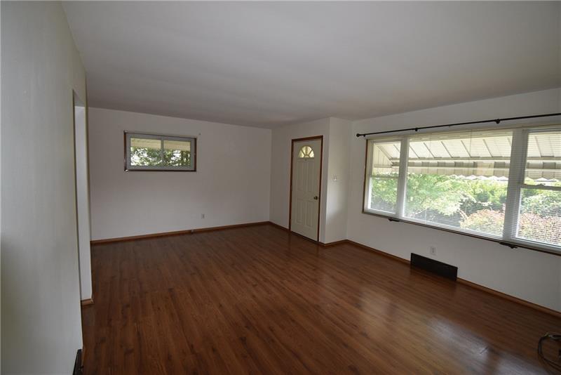 170 Franklin Farms Road Washington, PA 15301 - Photo 7 of 25 Natural light from the picture window brightens the living space.