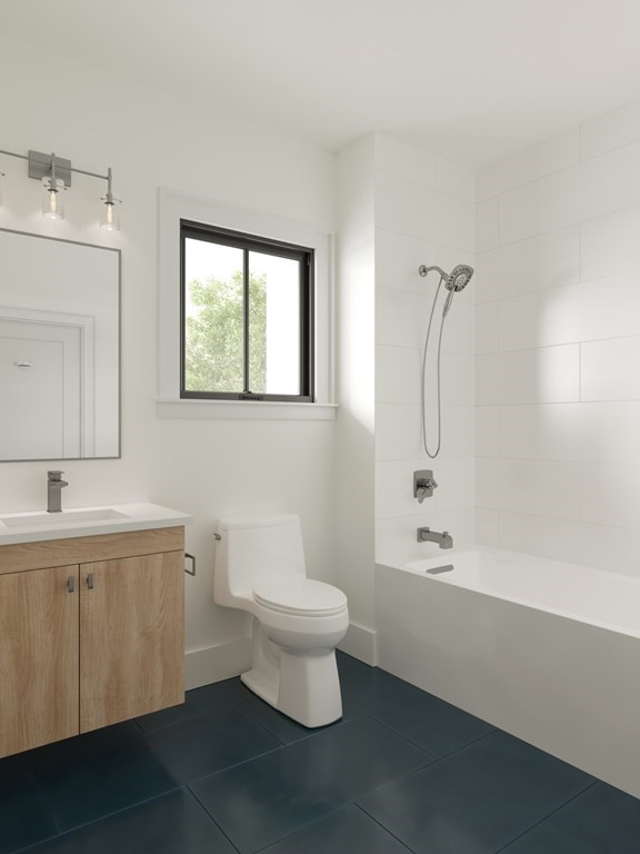 4 Anawan Avenue, Unit 4 Boston, MA 02132 - Photo 4 of 6 a bathroom with a toilet sink and mirror