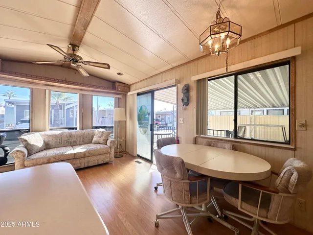 a view of a living room and dining room