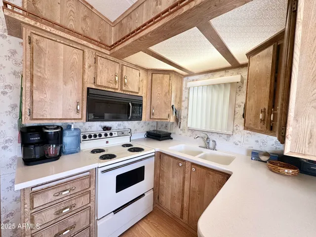 a bathroom with a sink double vanity and a bathtub