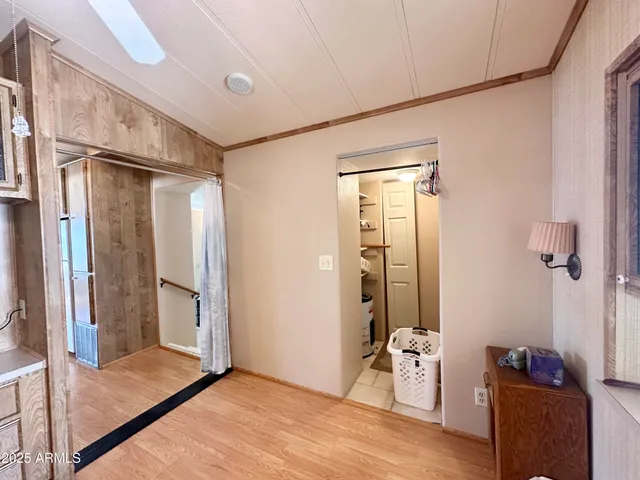 a view of a patio with table and chairs